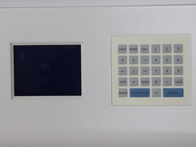 Atomic Absorption Spectrophotometer detail - Built-in computer data processing and LCD screen with interface to a computer.